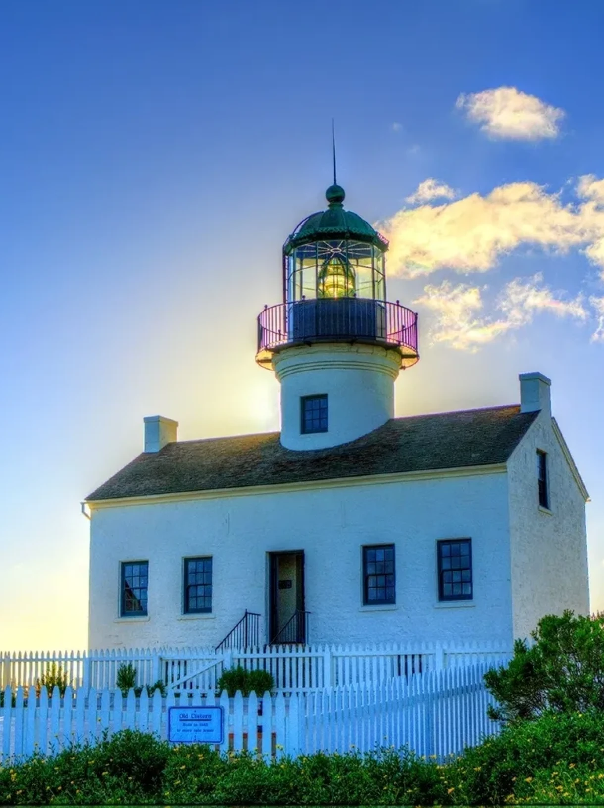 Lighthouse at sunset with clear sky
