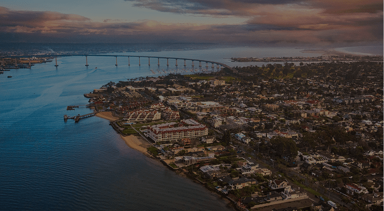 Aerial view of coastal city and bridge